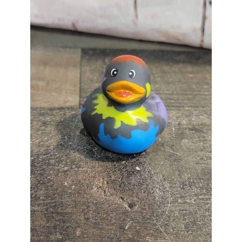 Black paint splatter rainbow rubber duck bath toy figure